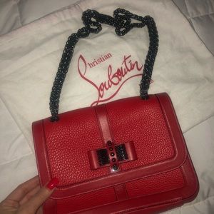 Red Christian Louboutin purse